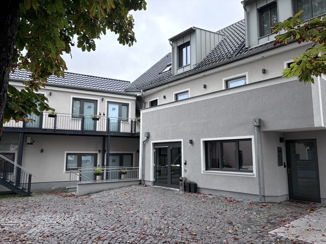 eco+ architekten - Projekt: Sanierung und Umbau einer alten Schlachterei zu einem Gebäude für die dauerhafte wohnwirtschaftliche Nutzung mit 25 Wohneinheiten im Effizienzhaus 40-Standard (Sanierung)
