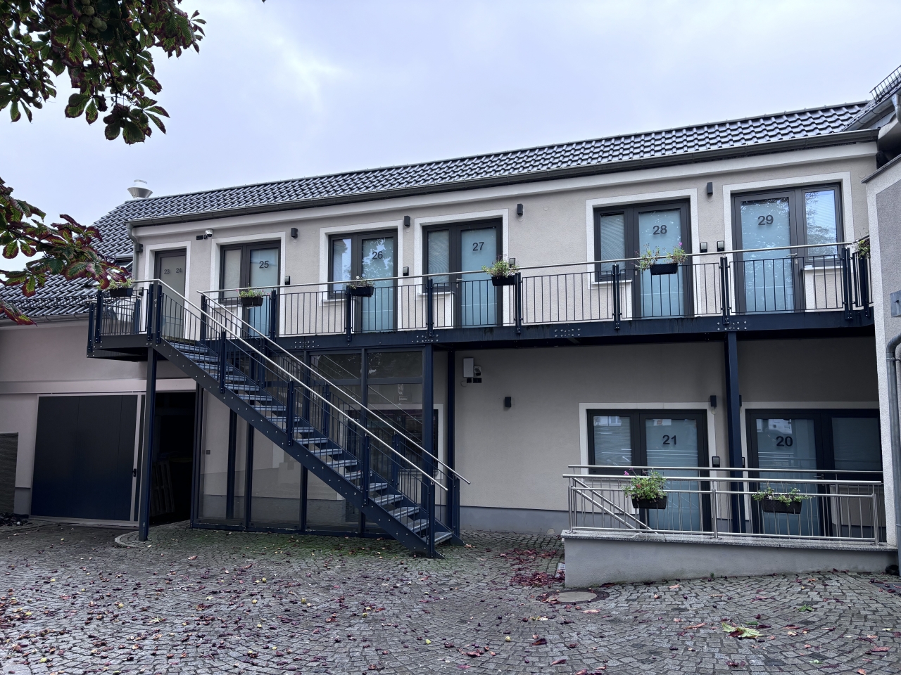 eco+ architekten - Projekt: Sanierung und Umbau einer alten Schlachterei zu einem Gebäude für die dauerhafte wohnwirtschaftliche Nutzung mit 25 Wohneinheiten im Effizienzhaus 40-Standard (Sanierung)